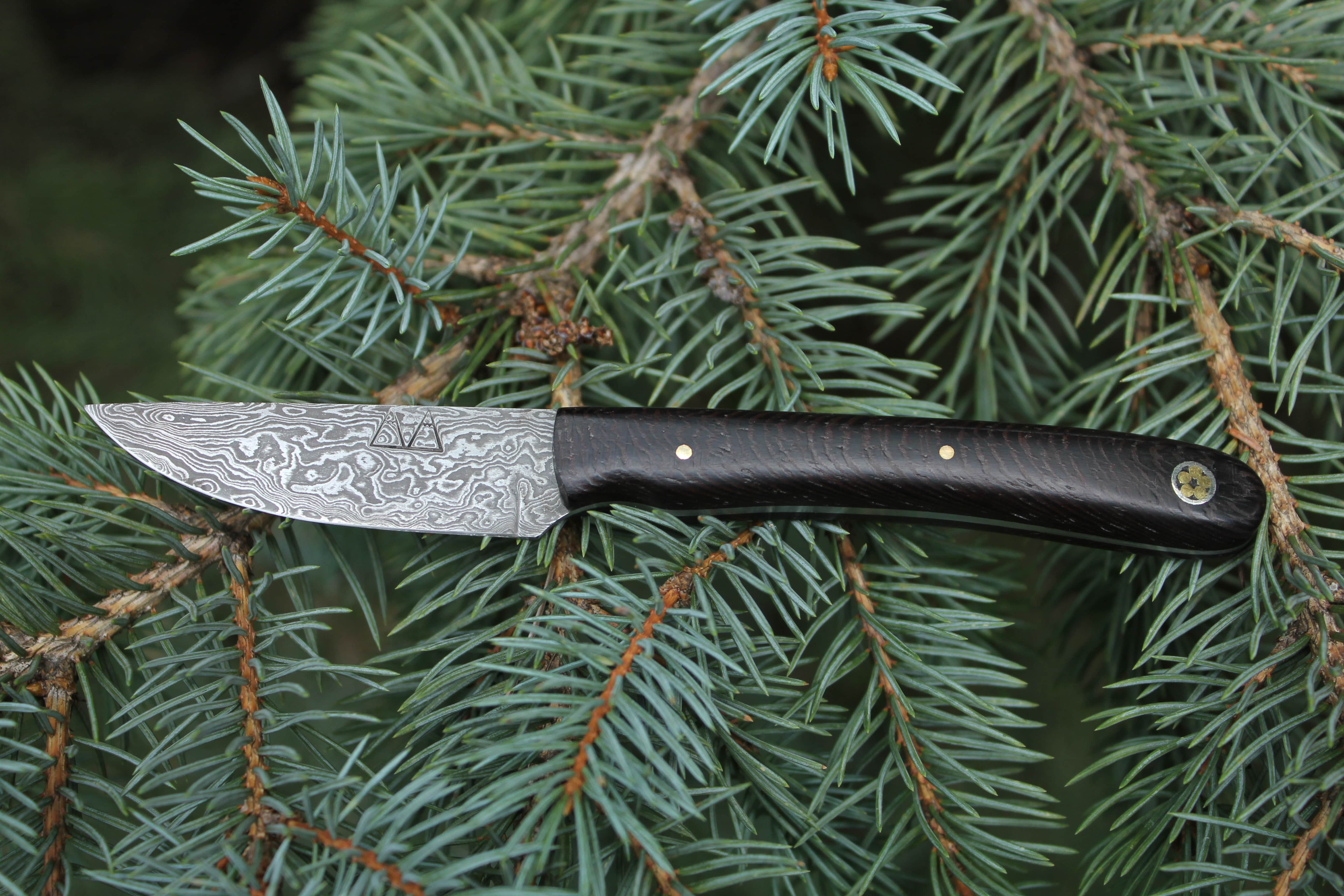 A 160-layer Damascus steel Malachite with a Wenge handle. A 160-layer Damascus steel Malachite with a Wenge handle.