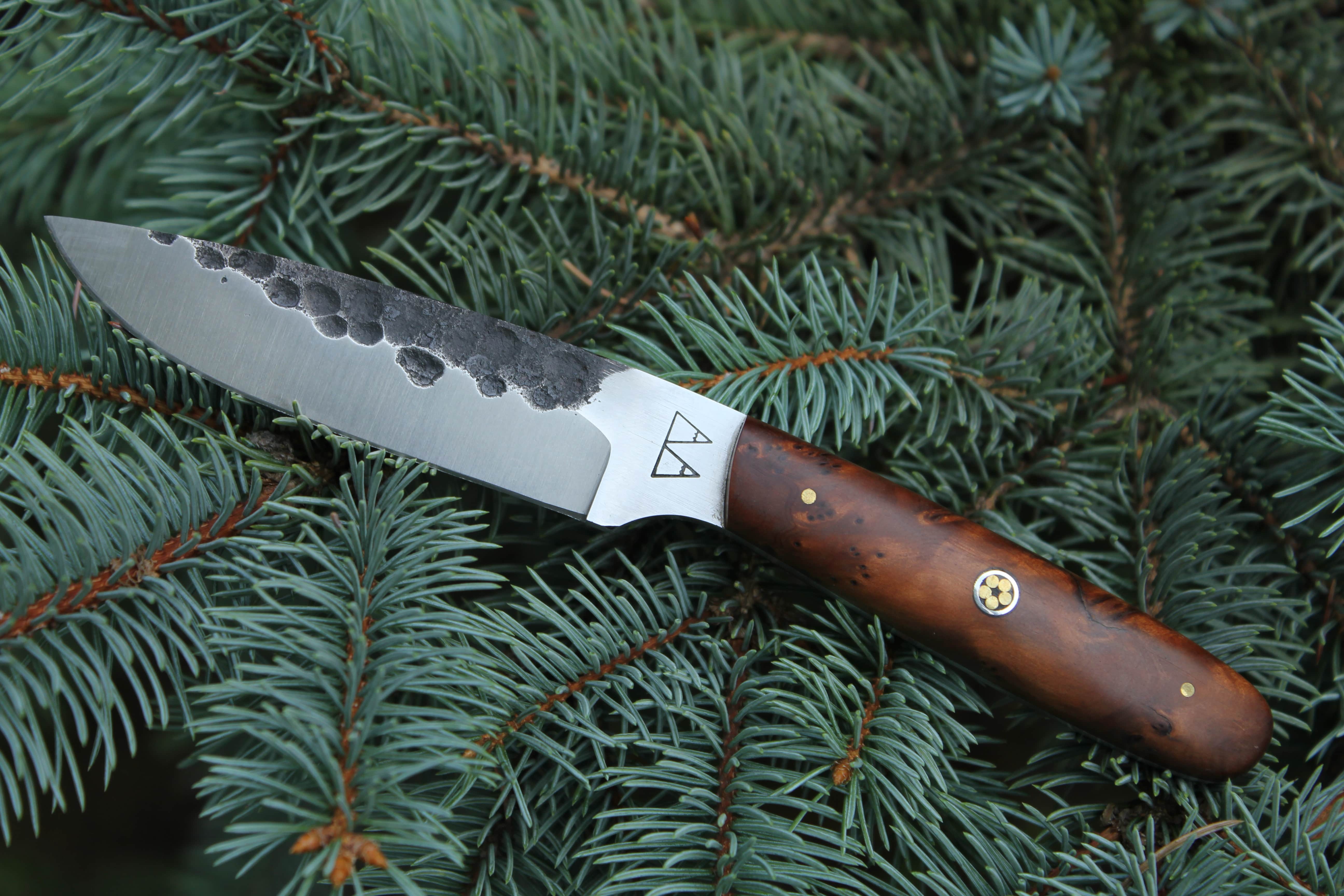 An Impala with a Thuya Burl handle and mosaic pin. An Impala with a Thuya Burl handle and mosaic pin.
