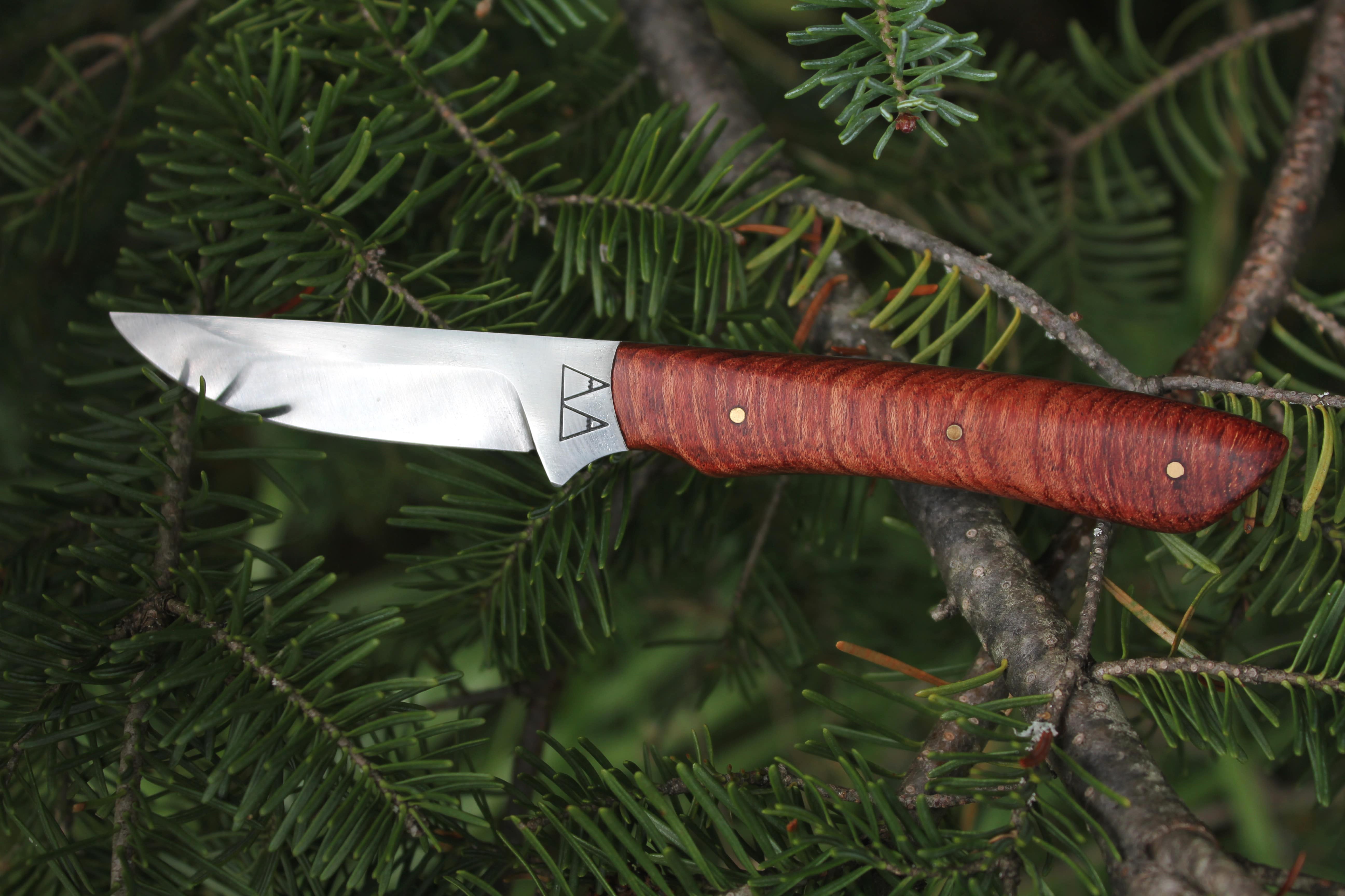 A custom Jackal with a Rosewood handle A custom Jackal with a Rosewood handle