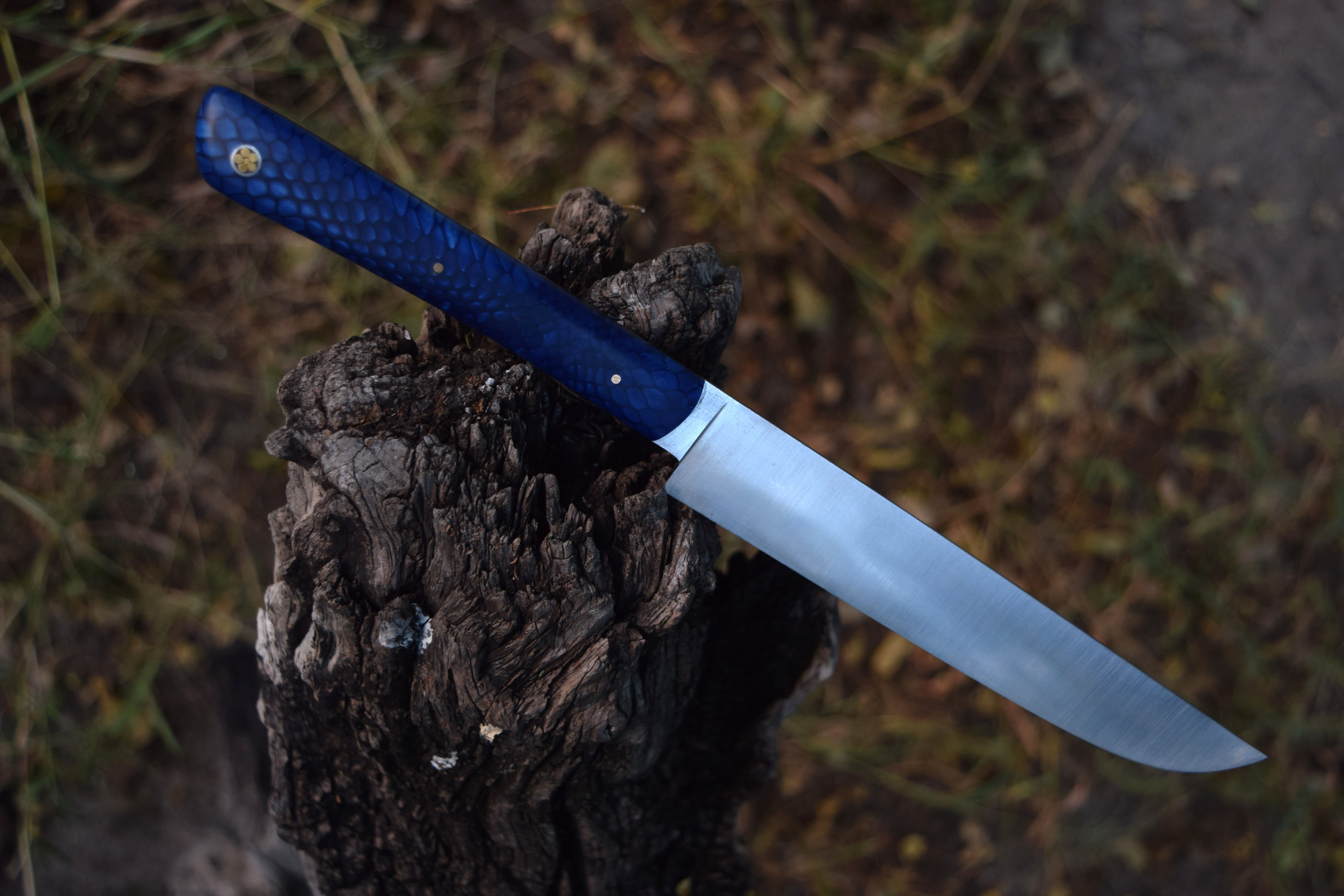 A custom Kudu with an Acrylic handle. A custom Kudu with an Acrylic handle.