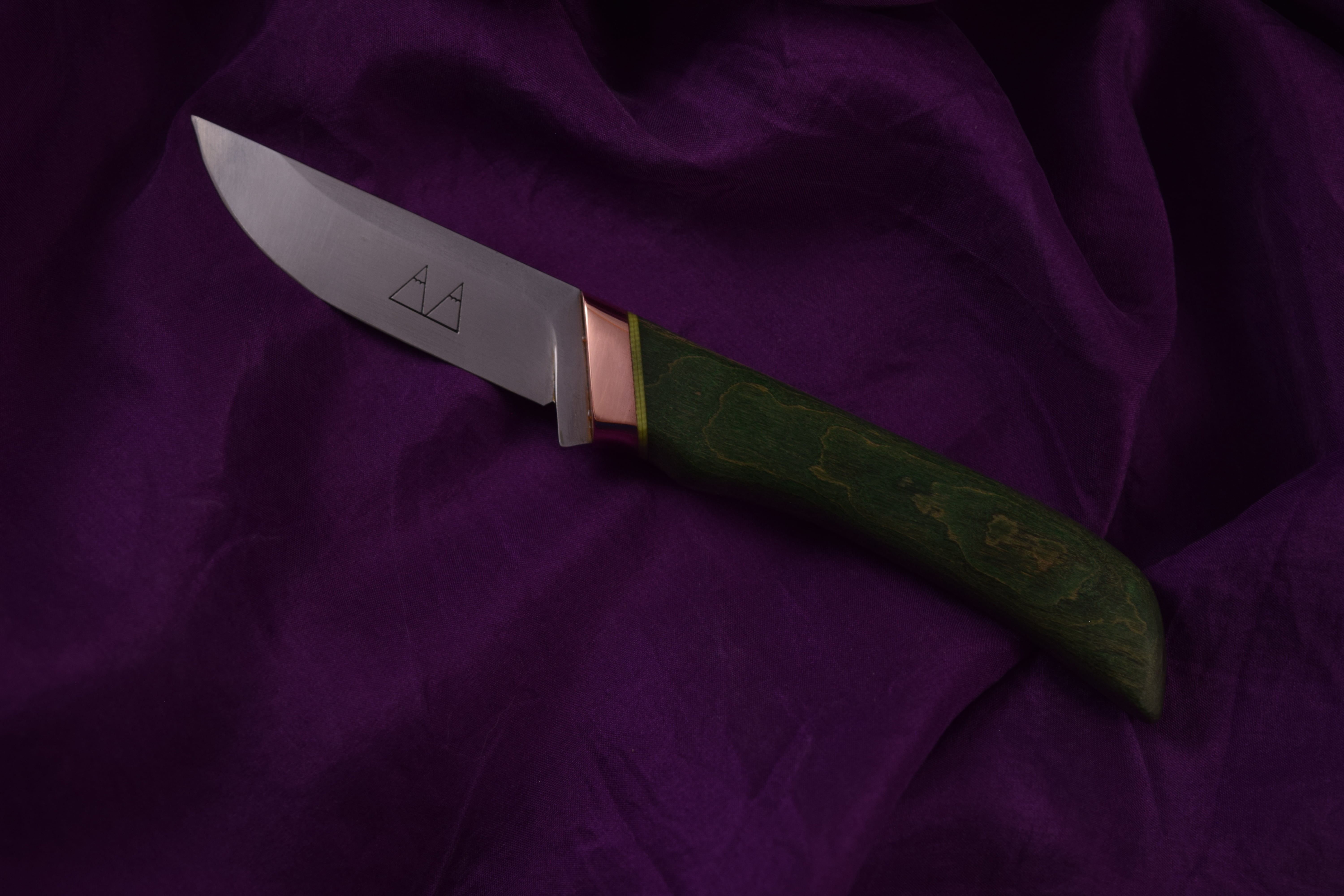 Jackal with a Copper Bolster and Dyed Maple Handle